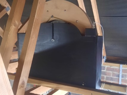 View from above of customised Home Dumbbell installed in the open loft rafters of a large garage. 1 of 3